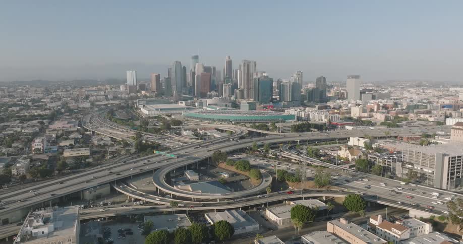 Aerial panorama of a metropolis with highways and viaducts