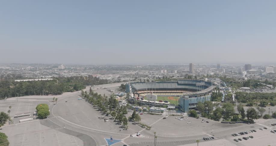A large baseball stadium is on the horizon