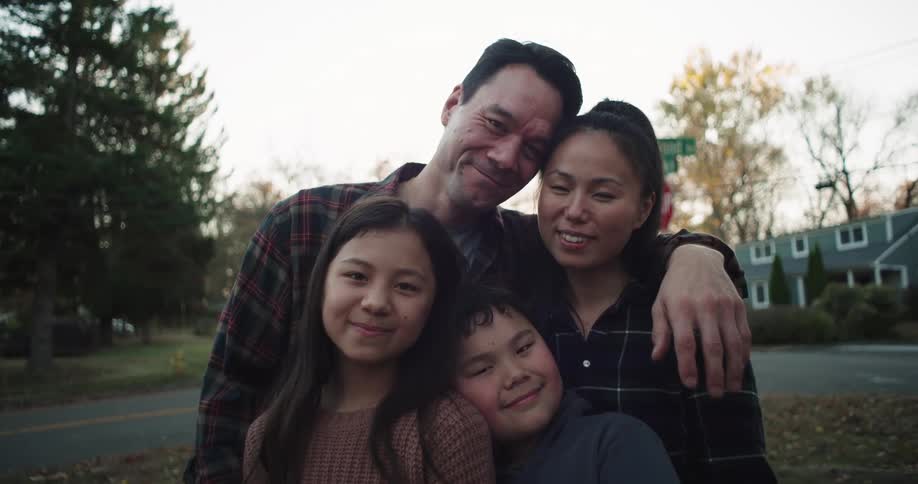 Portrait of a happy family hugging