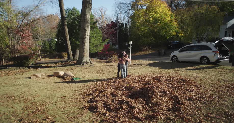 A clip of a family playing and embracing