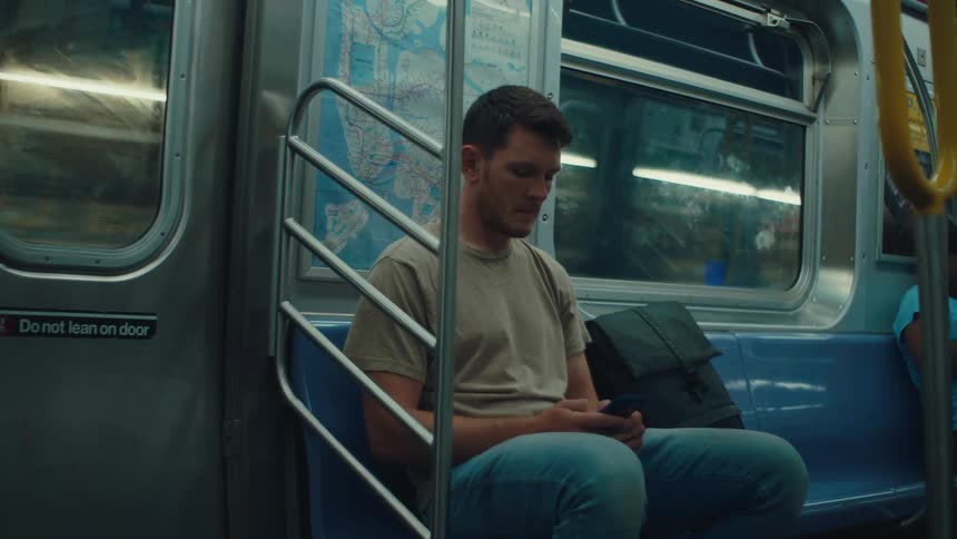 Man sitting on a moving train