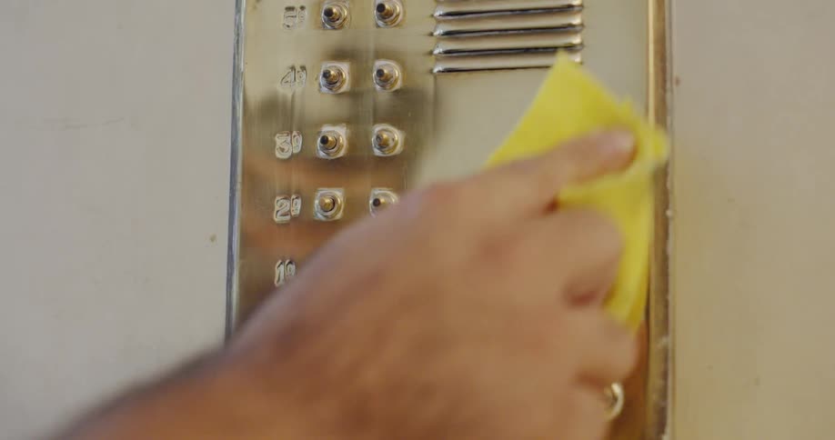 A person polishes the panel