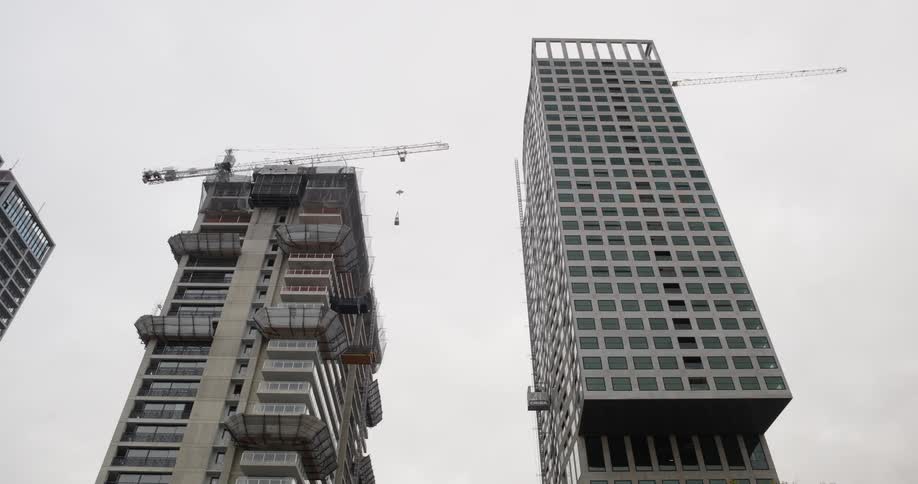 Upward view of buildings under construction