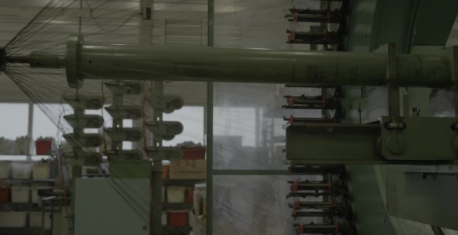 A factory machine is in motion