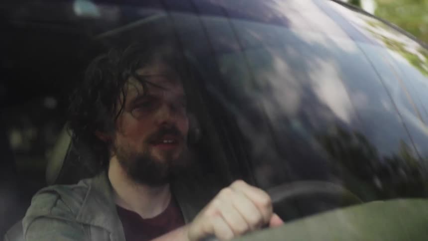 Man driving a car