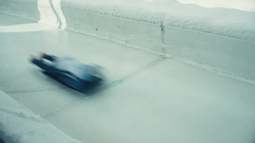 Sports ice rink with a person performing skeleton