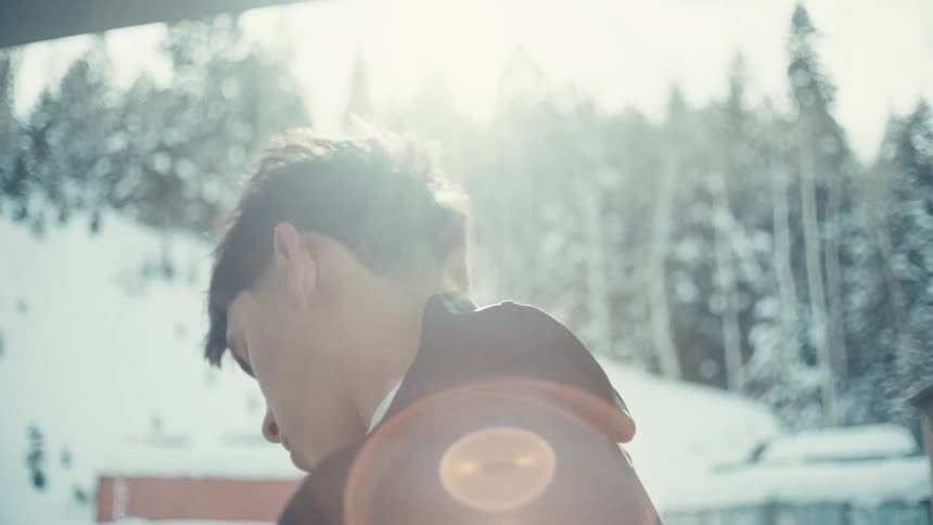 A footage of a person stretching the neck outdoor