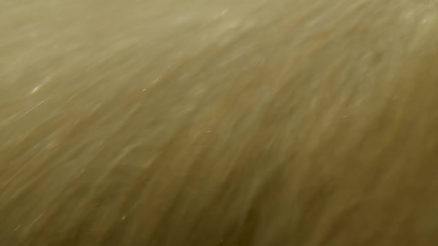 Extreme close up on an abstract flowing water