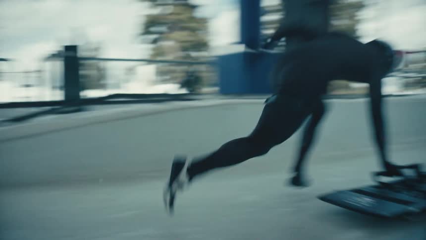 Person on an ice rink running on a skate