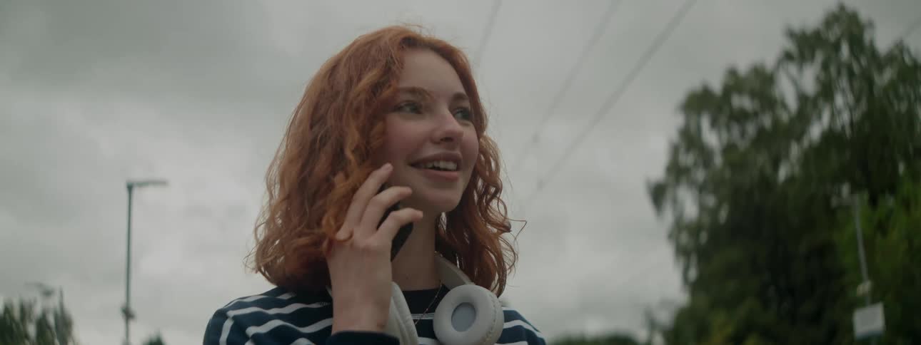 A close up clip of a lady making a phone call