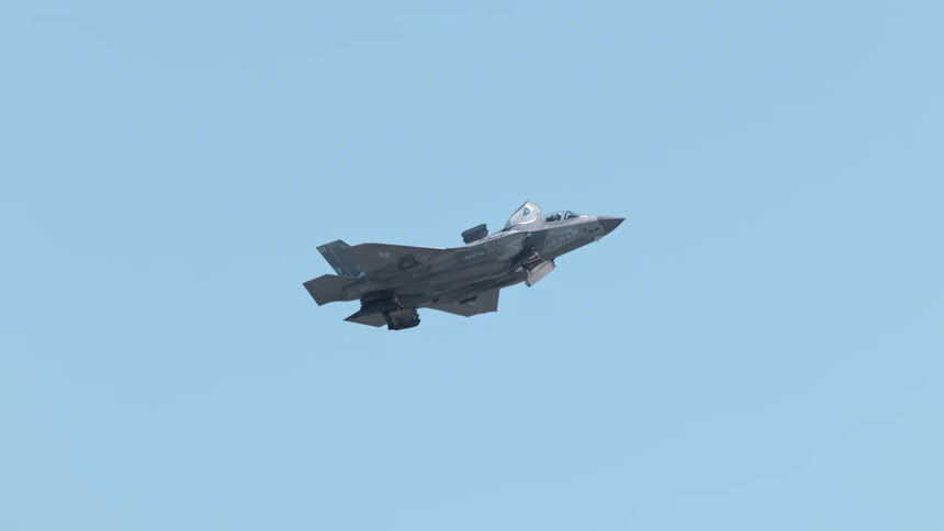A jet flies through the sky