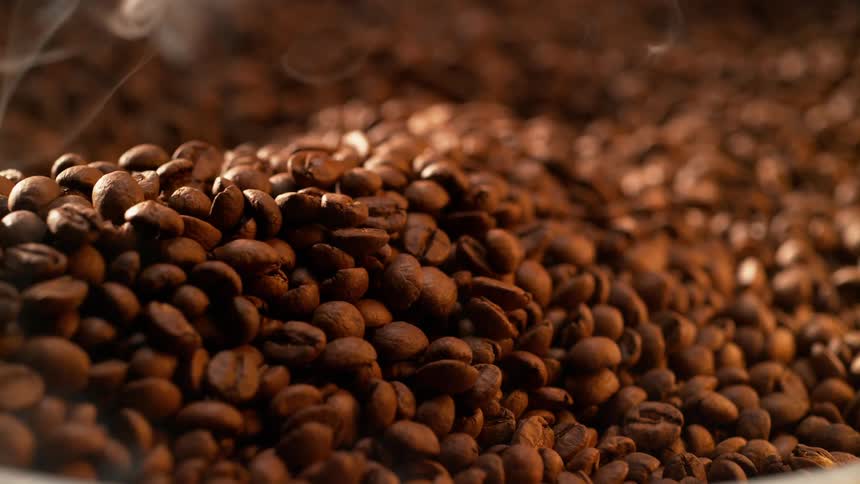 Coffee beans in rotating motion