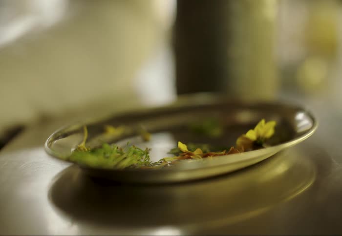 Food is picked up from a plate