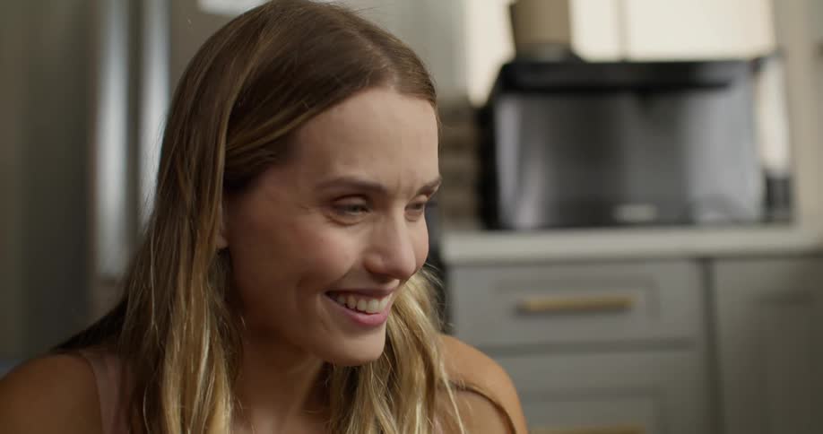 Portrait of a happy young blonde woman