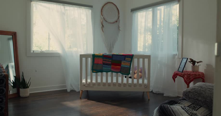 A crib sits in a room