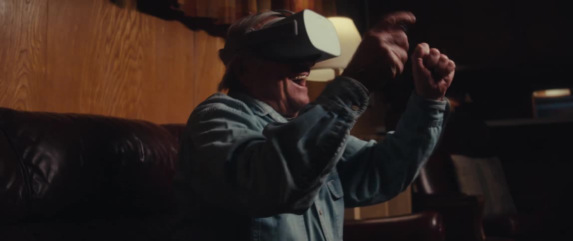 Man using virtual reality glasses having fun