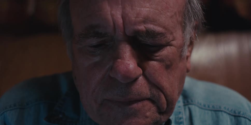 Portrait of an elderly man sitting