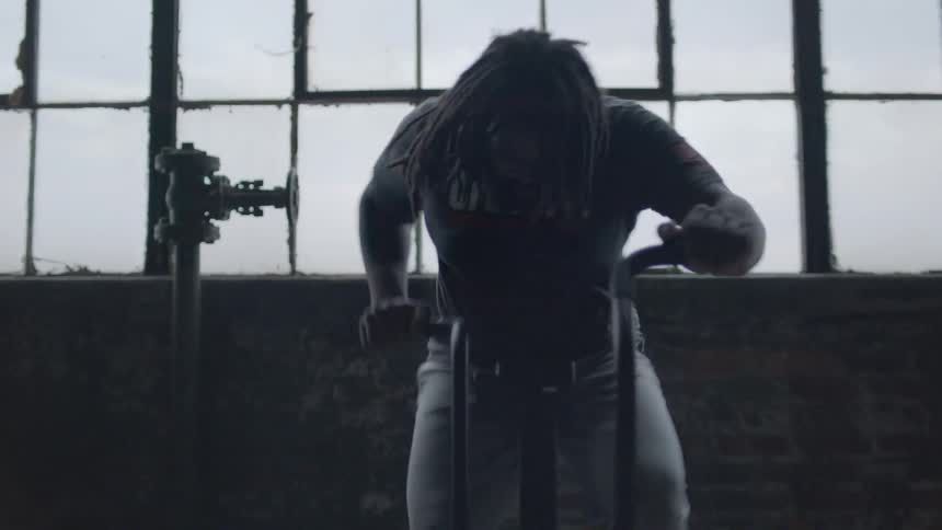 A man works out on a fitness bike