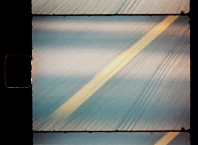 A car drives down a street