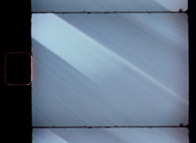 Close up of asphalt floor with white stripes in abstract motion