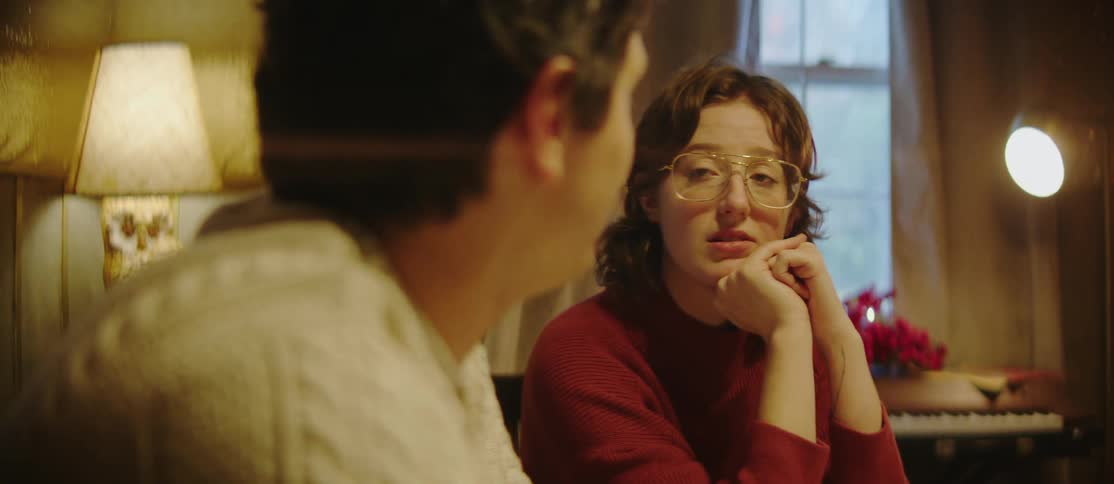 Man and woman sitting at a table talking