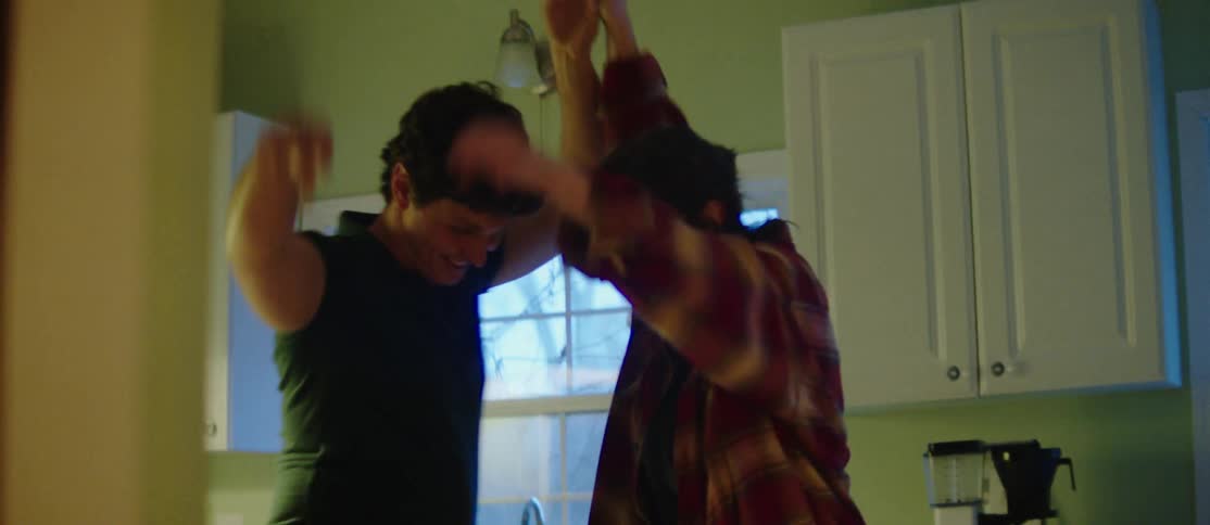 Young couple dancing together and having fun
