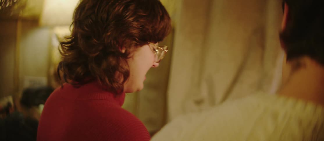 Man and woman sitting in a room