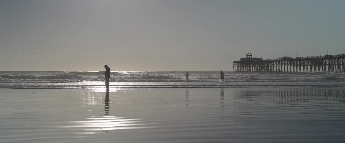 People are playing on the beach