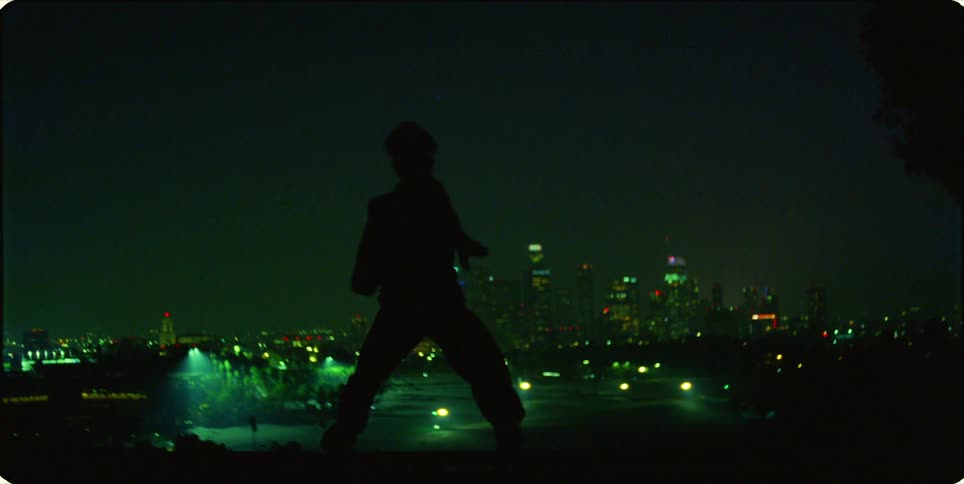 A clip of a person dancing in the night