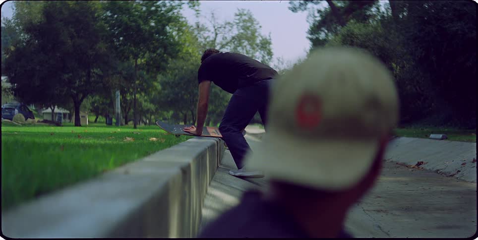 A clip of a person shaping a skateboard