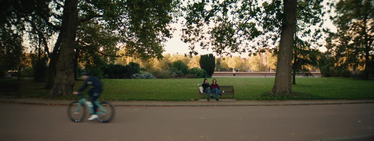 A clip of people sitting at the park