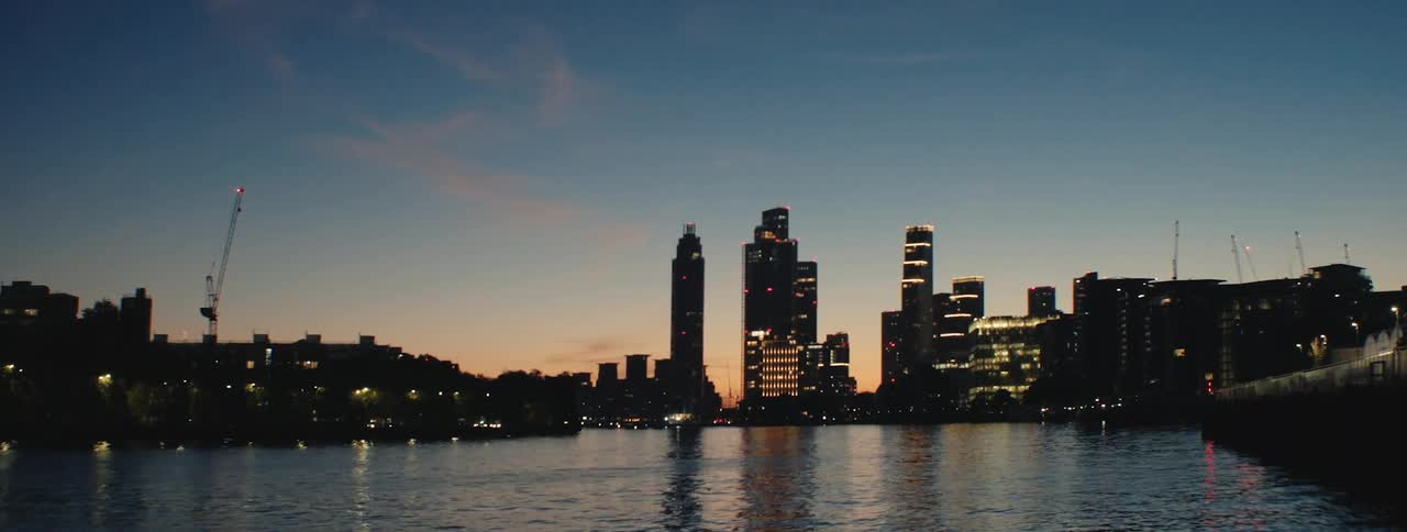 Maritime canal surrounded by a metropolis with skyscrapers