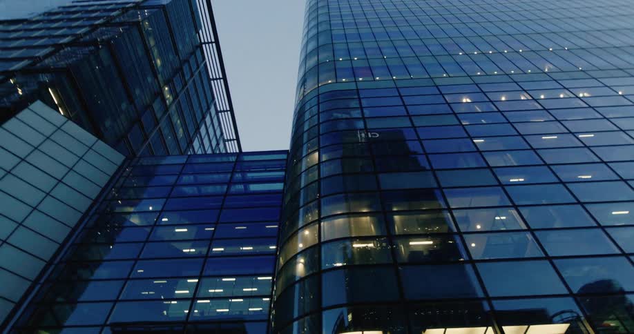 Upward view of mirrored skyscrapers