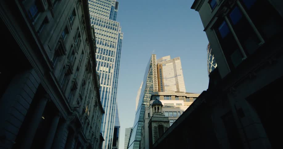 Upward view of modern buildings in an urban city