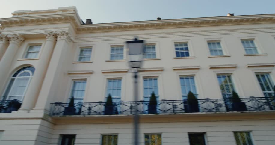 View upwards of a wide building with patterned windows