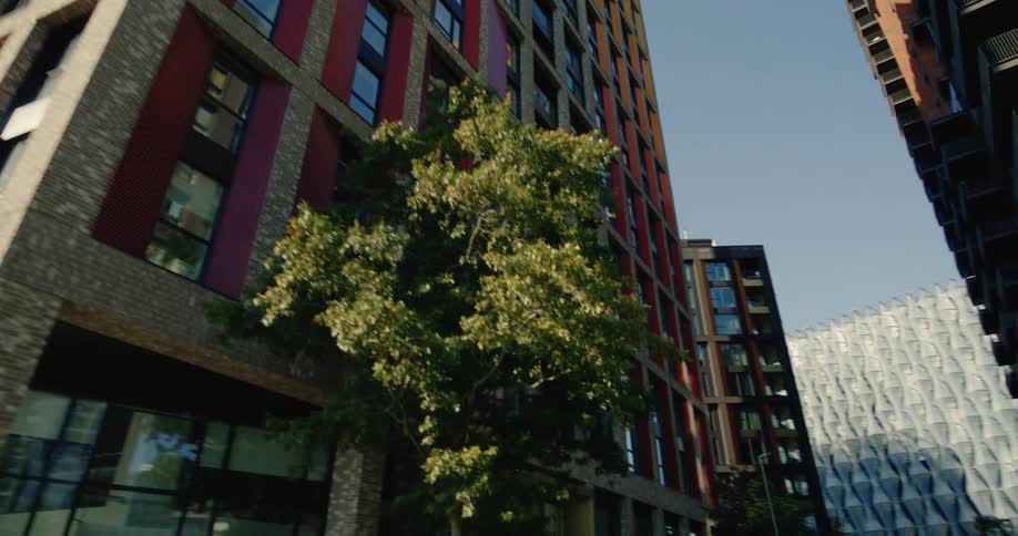 Upward view of urban and residential buildings in a metropolis