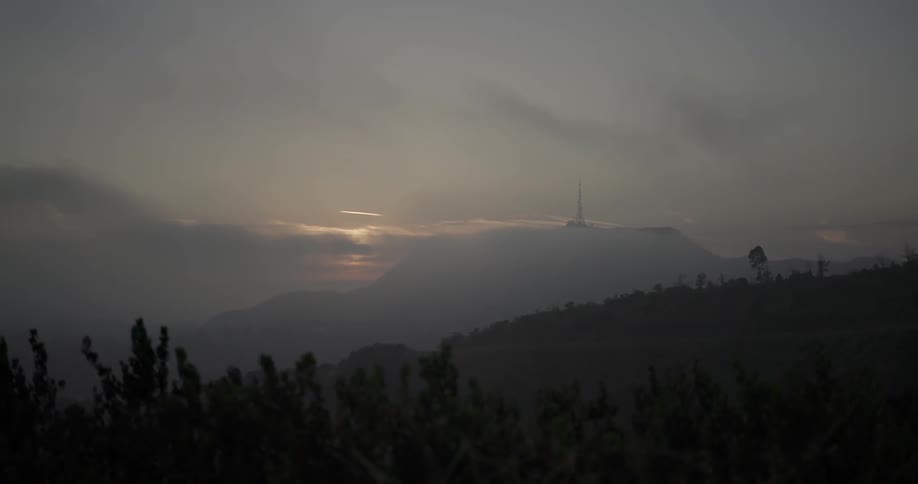 The sun sets over the horizon