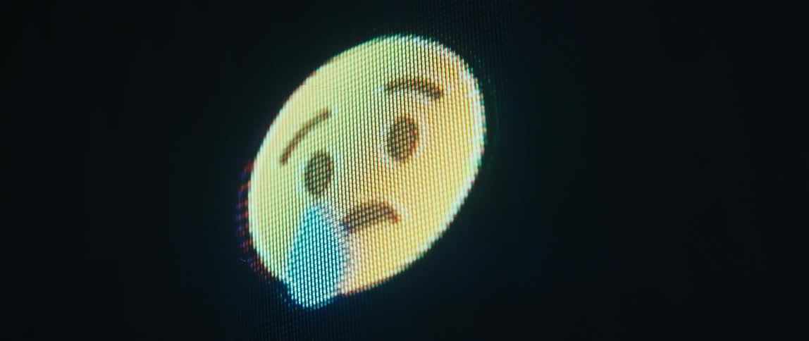 Digital face changes emotions from neutral to thinking and angry to crying and happy