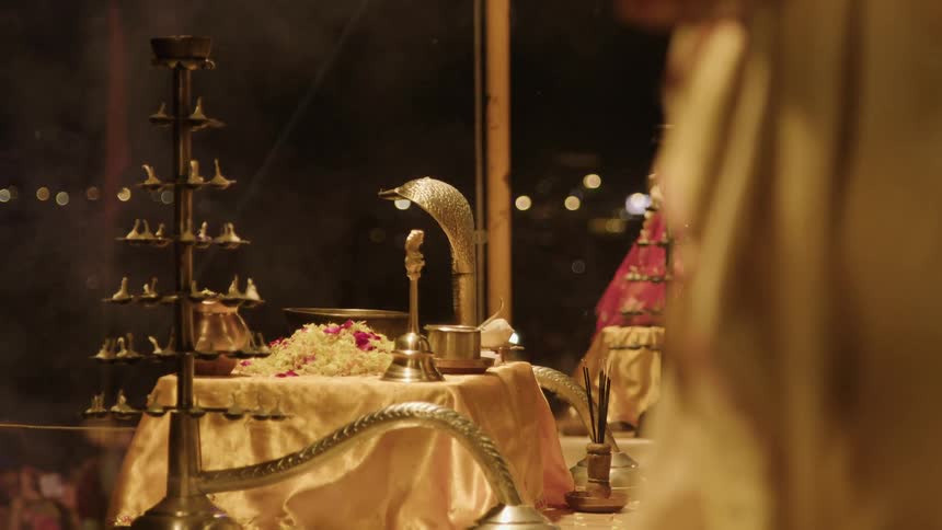 Altar with plant and golden chalices in a ceremony with
