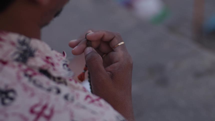 A close up clip of a person praying