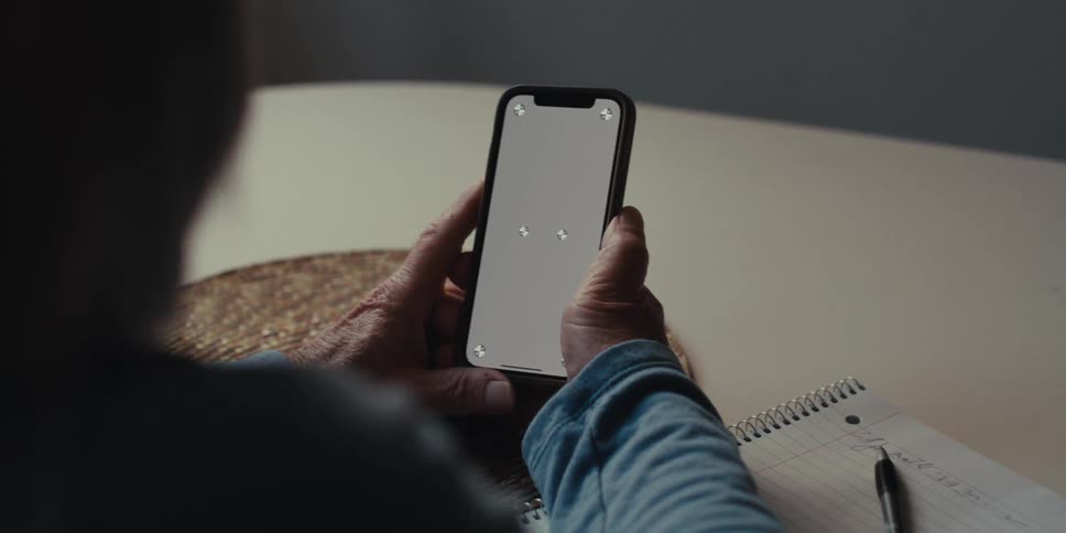 Hands holding a smartphone
