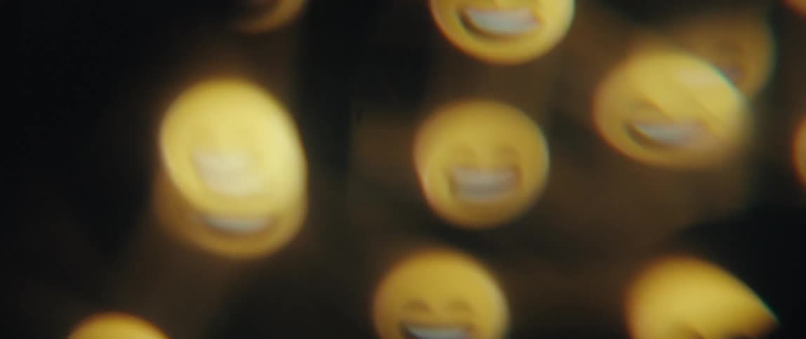 Abstract screen displaying different types of emojis