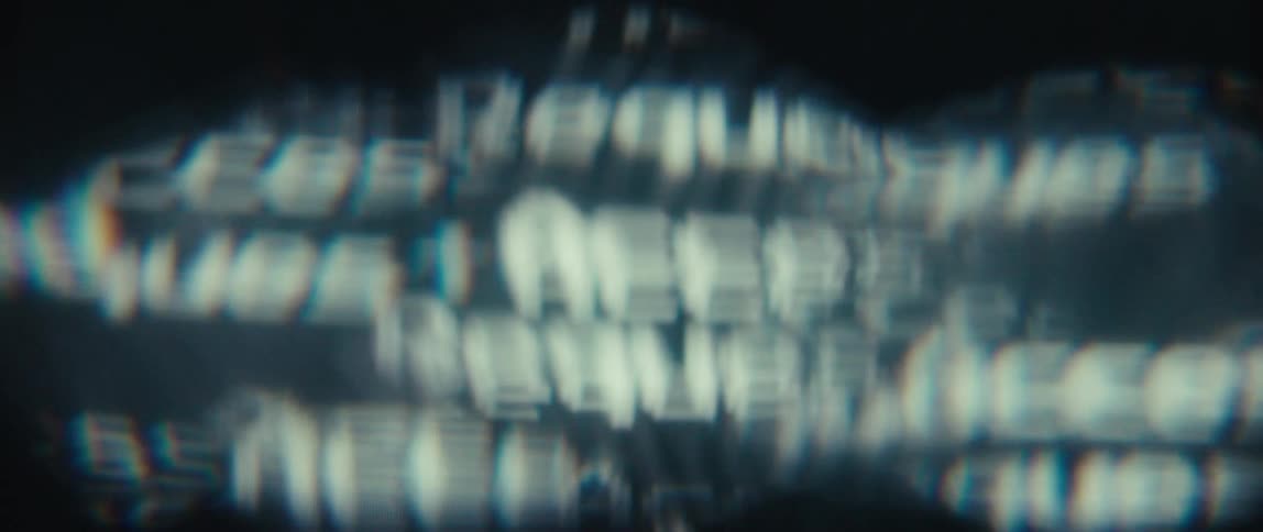 Abstract screen displaying blurred letters