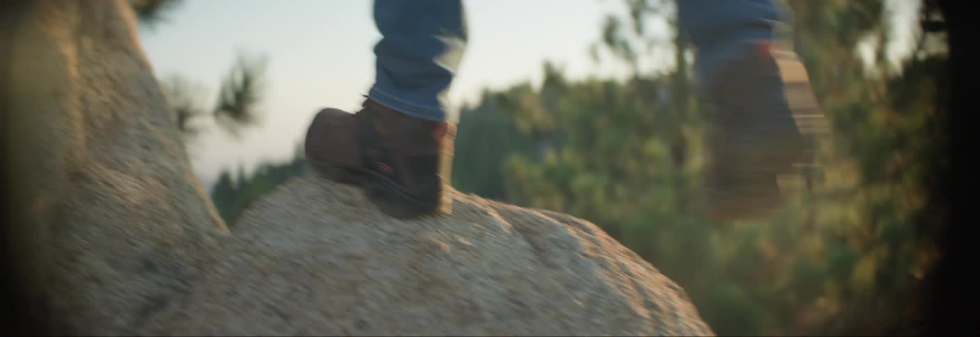 Man climbing rocks in nature
