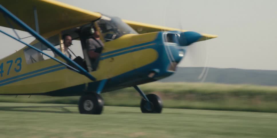 A plane drives towards the hangar