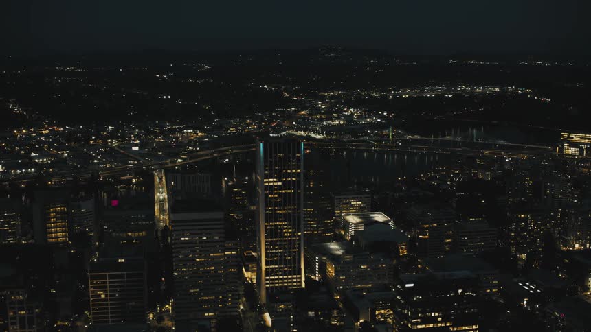 Aerial view of a metropolis illuminated at night