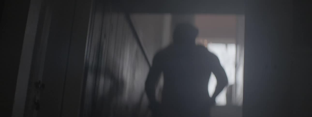 Person walking down the steps to a basement
