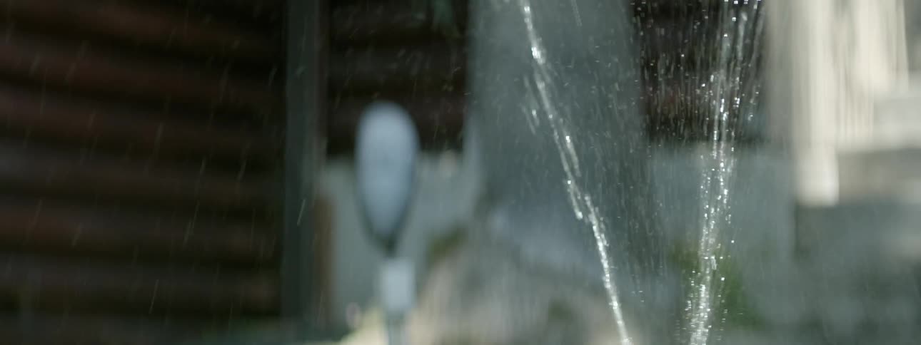 Water sprays in the air from a sprinkler