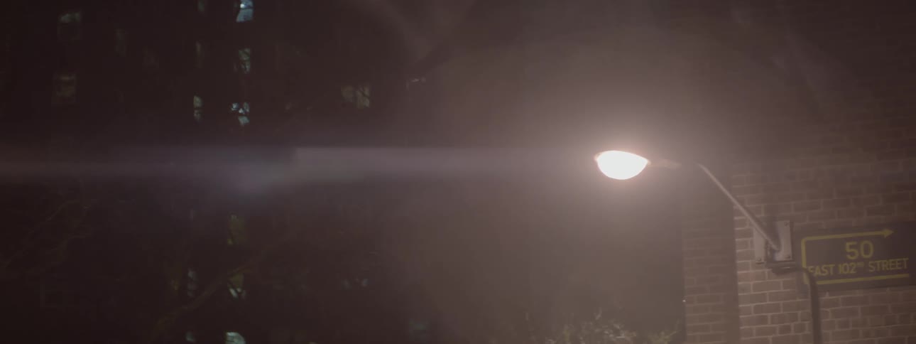 Street light shining at night