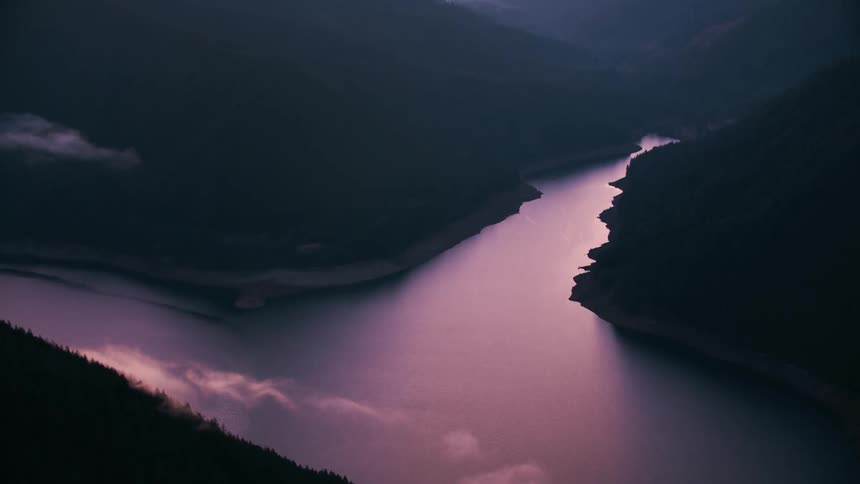 A river runs between some hills